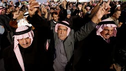  Iraqi troops killed five protesters on Friday when they opened fire at demonstrators angry at the troops for preventing them from attending an anti-government rally west of Baghdad, officials said.